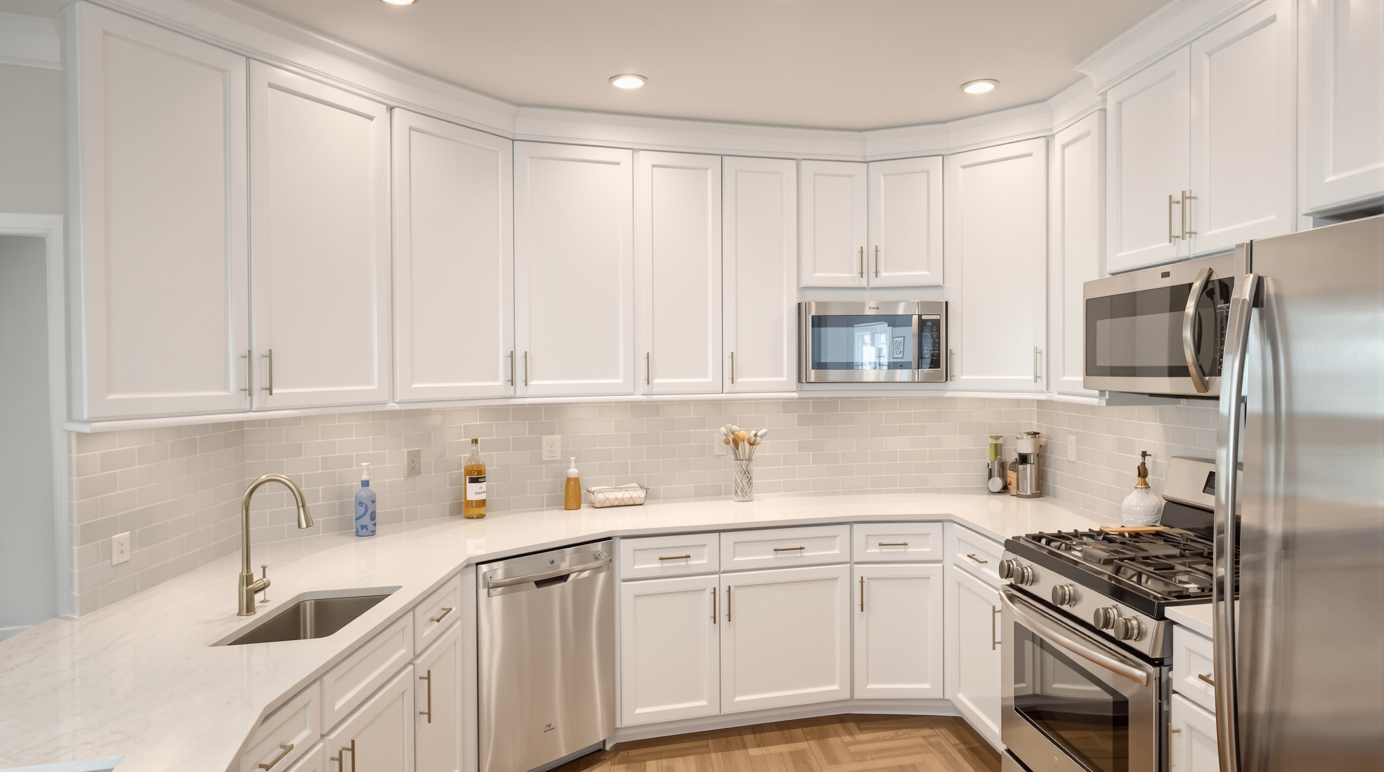Open-concept kitchen remodel in Los Angeles with quartz waterfall island